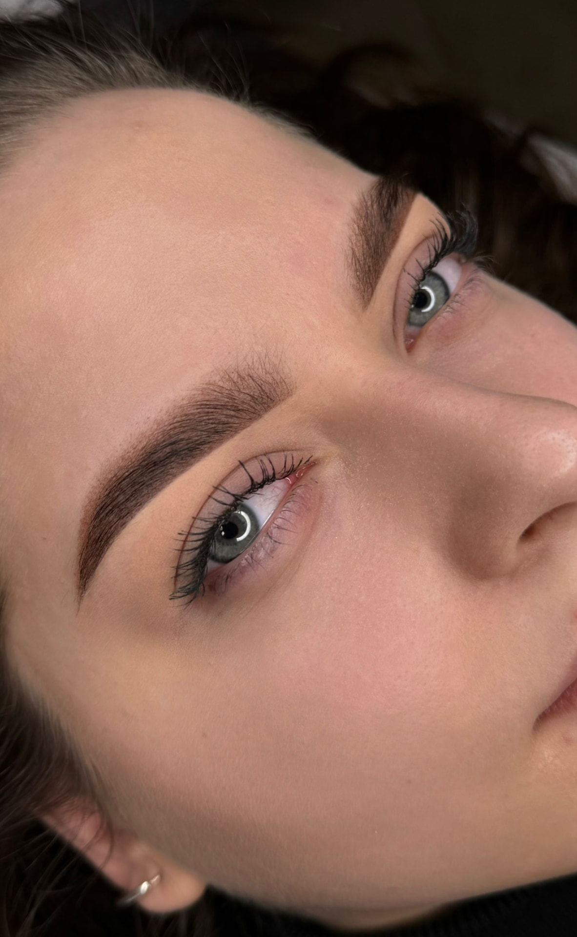 Natural brow shaping on both brows