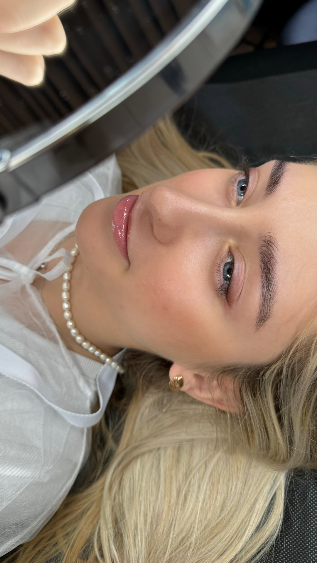 Brows and glossy lips after treatment