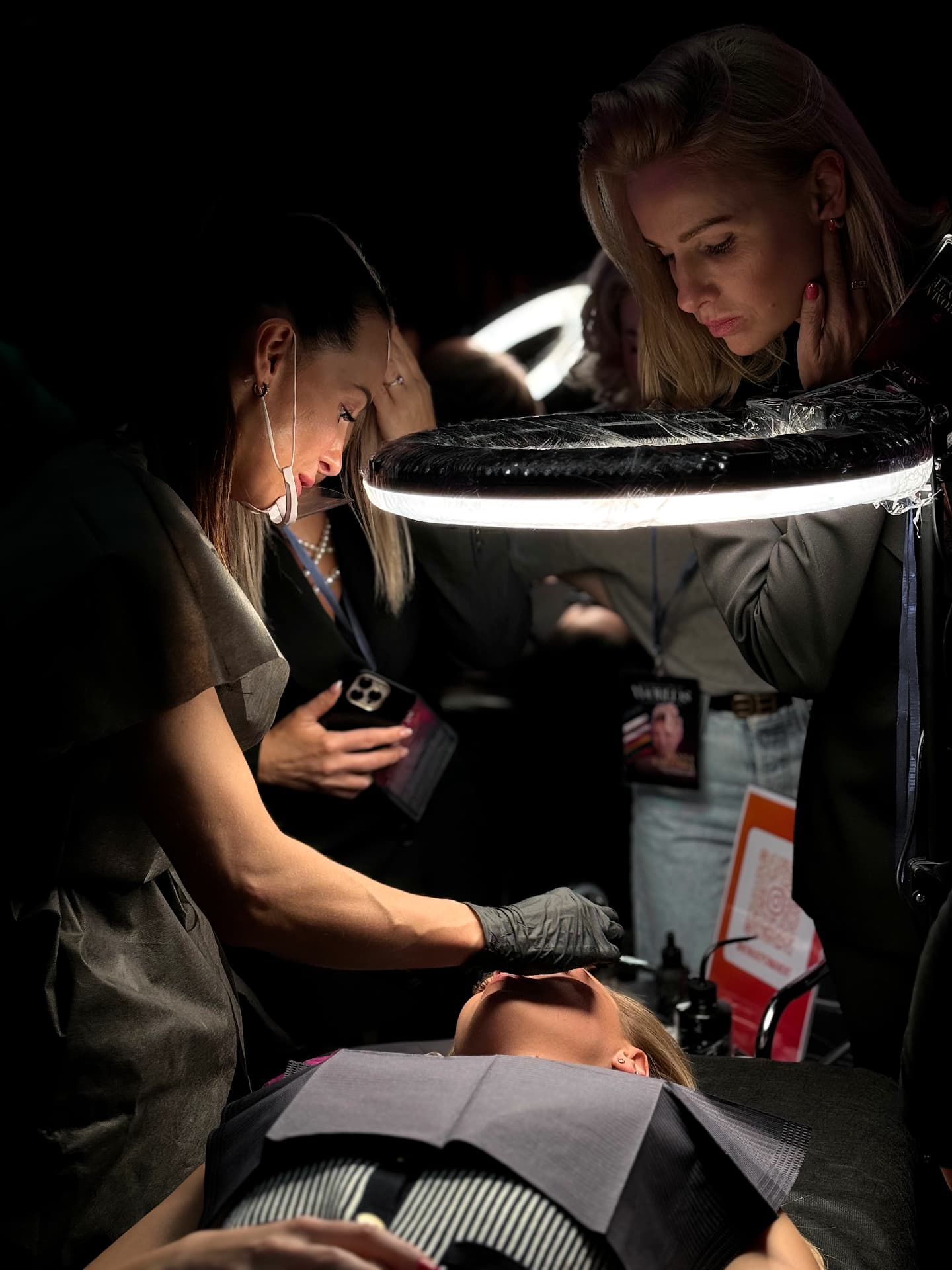 Close-up of a live permanent makeup masterclass demonstration